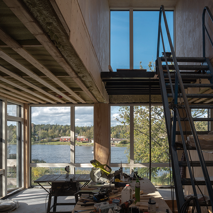 Living room with look-out mezzanine under construction